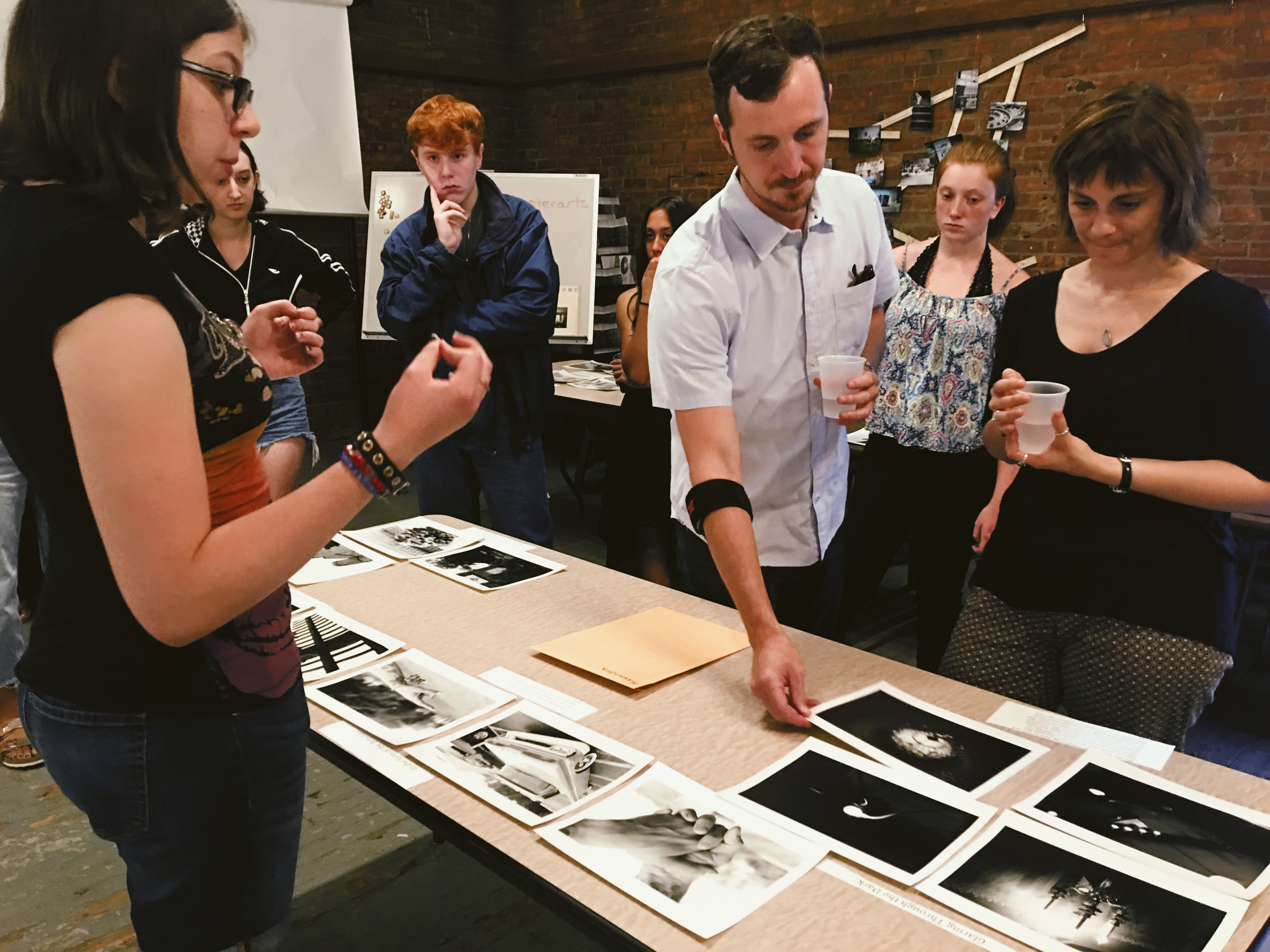 George Eastman Museum professionals review work by summer camp students