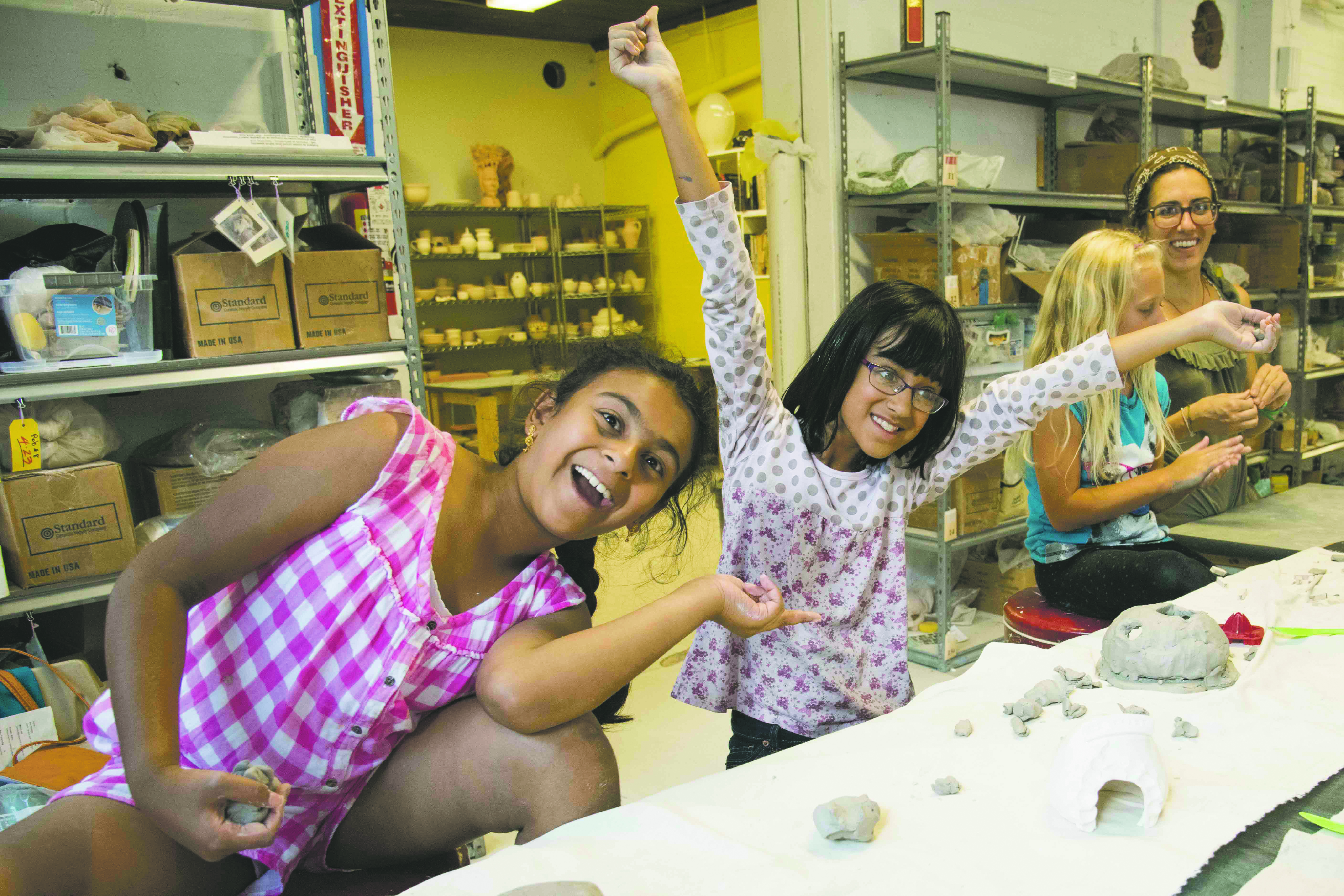 Camp students ham it up for the camera in the Ceramics studio